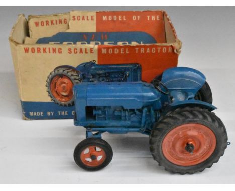 Chad Valley diecast model Fordson Major Tractor with blue body and red hubs, in original box.