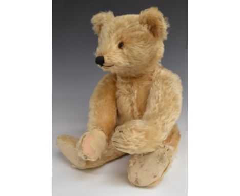 Steiff Teddy bear with blonde mohair, straw filling, disc joints, stitched features and button to ear, 50cm tall.&nbsp;