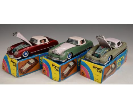 Three Lucky friction powered tinplate Sports Cars with opening car hood and front engine action, all in original boxes.&nbsp;