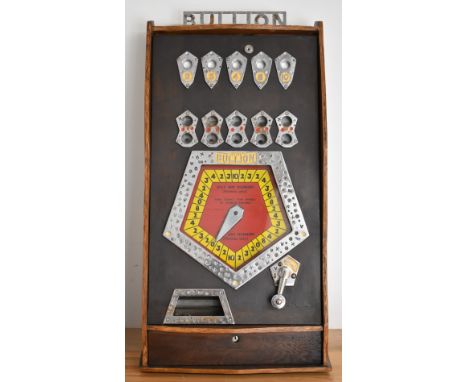 Bryans Bullion penny slot arcade machine with wooden case and chrome fittings, 81x42cm.&nbsp;&nbsp;