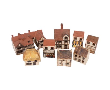 A collection of 8 O'Donoghue model pottery houses, the largest depicting the Mermaid Inn Rye, 24.5cm across