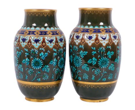 Sarreguemines, a pair of French late 19th century Majolica vases, with Aesthetic decoration and gilt highlights, with maker's