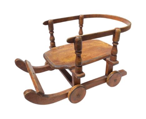 A Vintage child's pull-along sledge