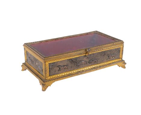 A small 19th century brass-framed table-top vitrine case, with relief cast copper wild boar hunting scene panels, 21cm x 11cm