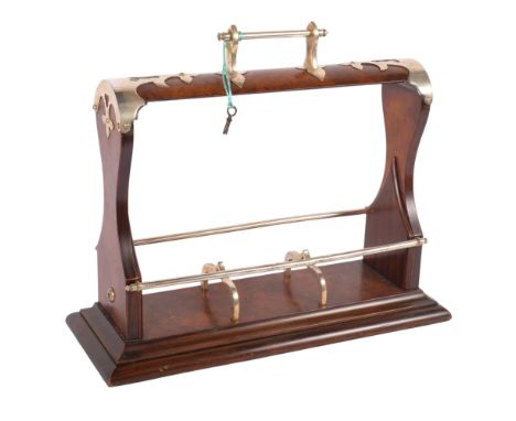 A Victorian Gothic walnut 3-bottle tantalus with plated mounts, L41cm (no decanters), with keyGood condition