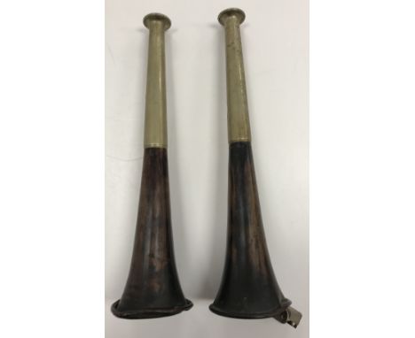 Two Dunhill table lighters in the form of hunting horns, one inscribed "D.L-JCL from ADL-DEL 1909-1934" 22.8 cm, the other in