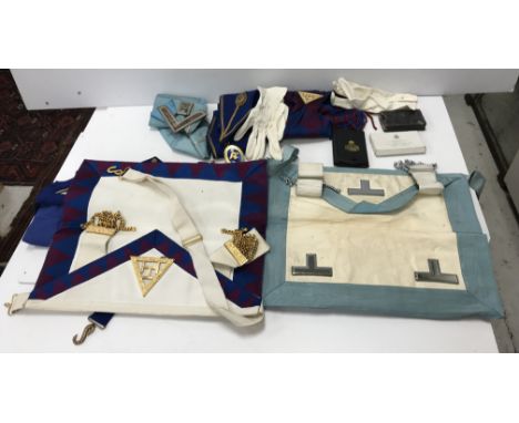 A suitcase of various Masonic regalia and badges relating to W Bro C R Anderson of the Porta S Episcopi Lodge including one b