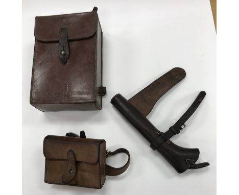 A real hide leather sandwich box holder, a hunting horn holster and a larger leather saddle box
