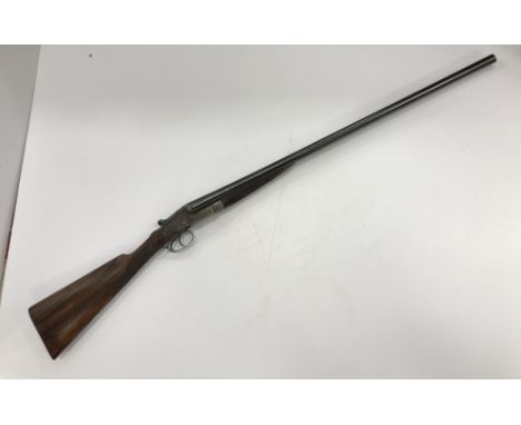 An Army & Navy CSL 12 bore shotgun, double barrel, side by side, sidelock ejector, the metalwork with foliate scrollwork and 