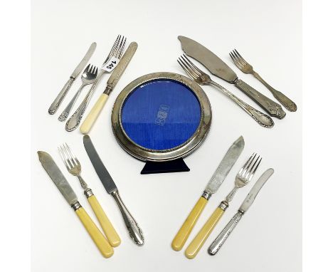 A quantity of mixed silver and other cutlery, together with a silver fronted photo frame (engraved).