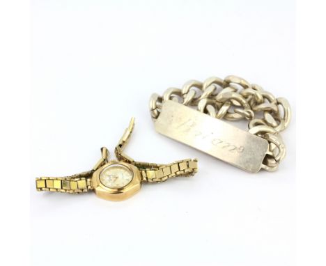 A 9ct yellow gold watch on a gilt strap together with a heavy  hallmarked silver chain bracelet.