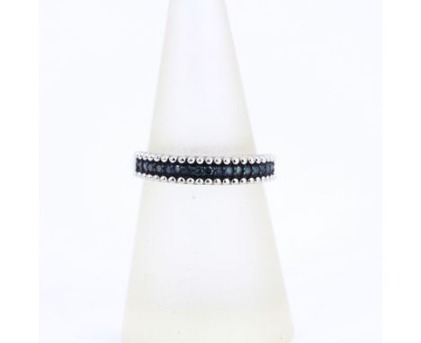 A 925 silver ring set with brilliant cut fancy blue diamonds, L.5.