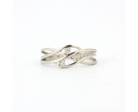 A 9ct white gold ring set with three brilliant cut diamonds, (O).
