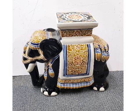 A Chinese ceramic elephant garden stool, H. 43cm.