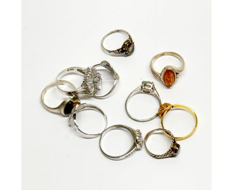 A quantity of mixed silver and other rings.