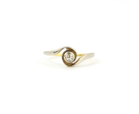 An early 20th century 18ct gold and platinum swirl ring set with an old cut diamond, (M).