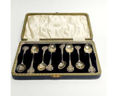 A cased set of hallmarked silver rifle society coffee spoons.