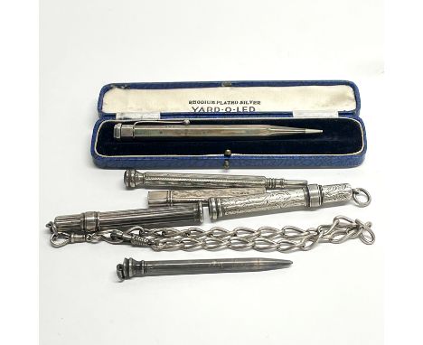 A group of mixed silver pencils and chain.