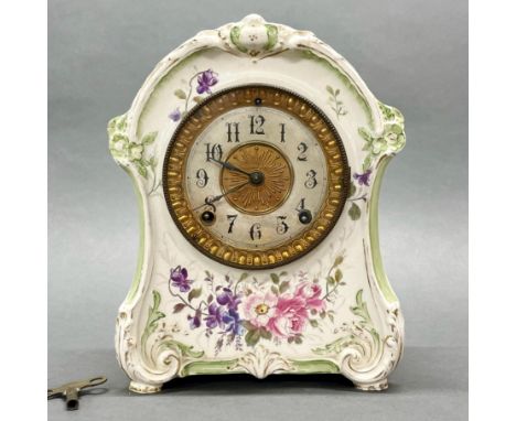A 19thC porcelain mantel clock, H. 26cm.