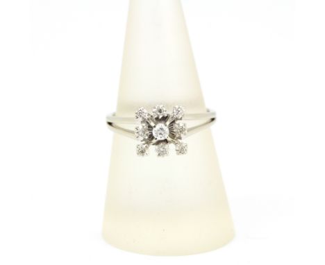 An 18ct white gold diamond set ring, O.5.