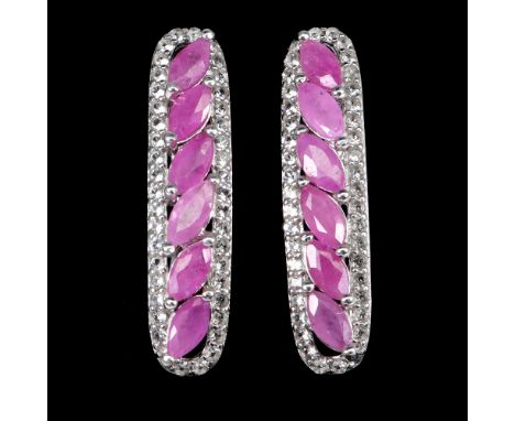 A pair of 925 silver earrings set with marquise cut rubies and white stones, L. 2.5cm.
