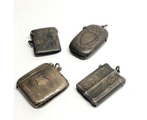 A group of four hallmarked silver vesta cases.