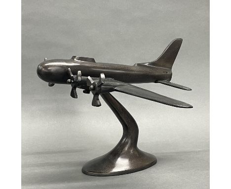 A bronzed metal model aeroplane, wing span 56cm.
