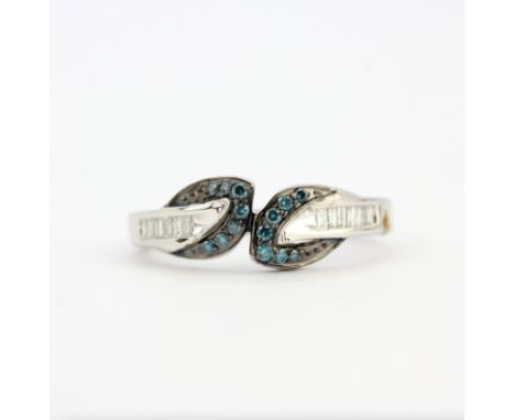 A 9ct white gold ring set with brilliant cut fancy blue diamonds and baguette cut diamonds, N.
