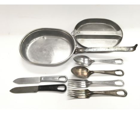 U.S mess tin 1944 (M.A.CO) with two sets of U.S Army field cutlery. One knife with Bakelite grip. One knife by L.F &amp;CO. O