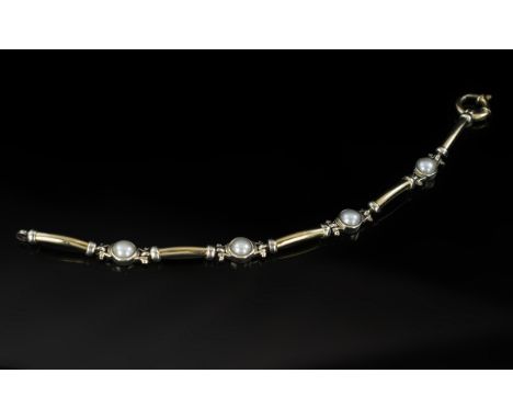 Ladies - Attractive Two-Tone 9ct Gold Contemporary Designed Pearl Set Bracelet with Excellent Clasp. Marked 9ct. All Aspects 