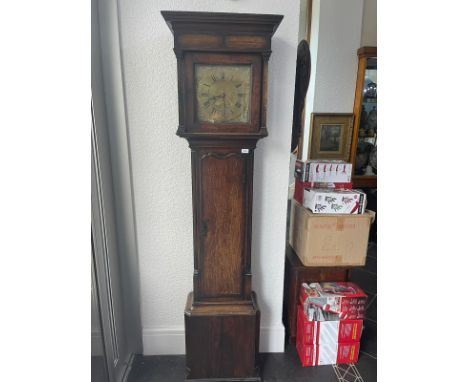 An 18th Century Oak 30 hour Long Case Clock, with a brass 11" dial with applied spandrels.  Roman numerals, height 83".