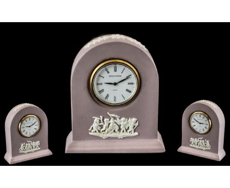 Wedgwood White on Lilac Jasperware Miniature Clock, rare colourway.  Measures 3.5" tall.