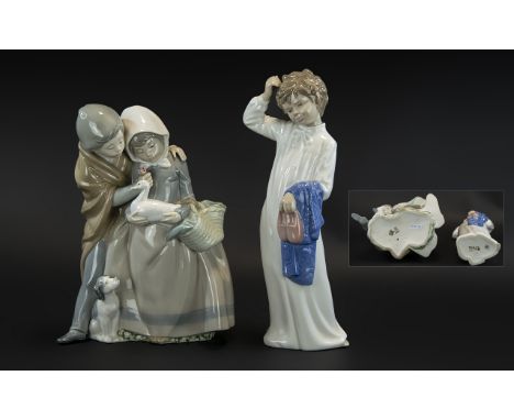 Pair of Nao Figures, comprising: boy and girl with a duck and puppy, measures 9.5'' tall; and a girl in a nightgown holding h