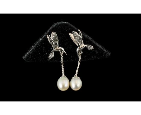 Cultured Fresh Water Pearl 'Bird in Flight' Drop Earrings, each solitaire pearl suspended from a detailed silver bird with ou
