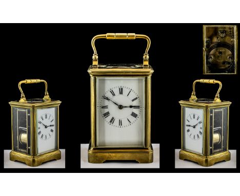 Henri Jacot French Carriage Clock striking on a gong, Enamelled Dial With Roman Numerals, The movement back plate stamped wit