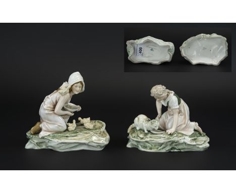 Karl Ens Superb Quality Pair of Early 20th Century Hand Painted Porcelain Figures, the first shows a young farm girl feeding 