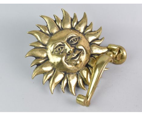 A Reproduction Georgian Style Brass Door Knocker with Striking Plate and Fitting together with a Brass Sunburst Wall Hanging,