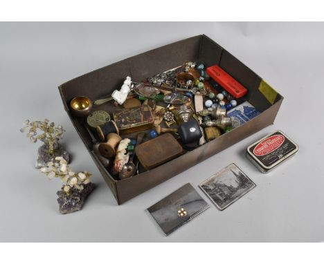 A Collection of Curios to Include Vintage Tins, Silver Plated Item, Vintage Marbles, Pocket Watch Movements and Faces, Dutch 