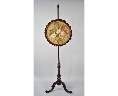 A Mid 19th Century Rise and Fall Pole Screen with Tapestry Panel on Tripod Supports