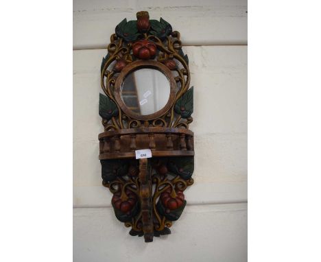 Carved wooden wall mirror and shelf