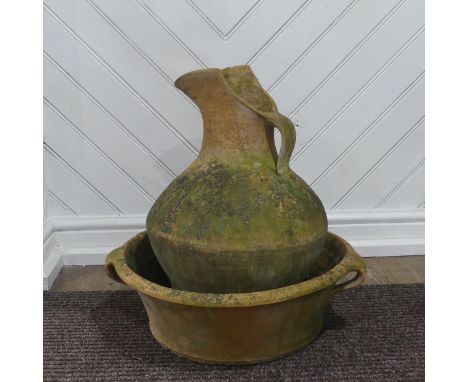 A Large weathered terracotta jug and three handled basin, (Basin) W 54 cm x H 16 cm x D 54 cm, (Jug) W 35 cm x H 50 cm x D 35