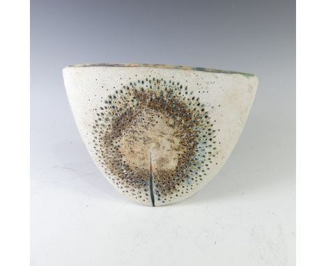 An Alan Wallwork studio pottery 'Delta' Vase, of semi circular flattened form with pierced circular designs and typical split