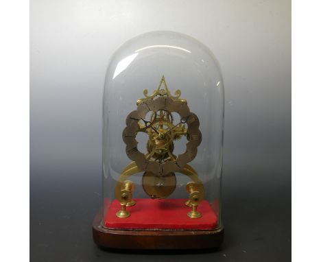 A late Victorian brass Skeleton Timepiece, the silvered chapter ring with Roman numerals, single fusee movement with four-spo