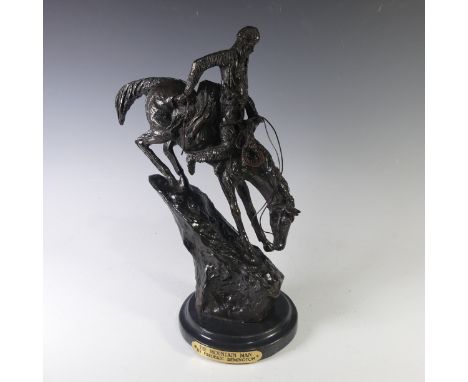 After Frederick Remington (American, 1861-1909), The Mountain Man, patinated bronze of a native American trapper, signed, on 
