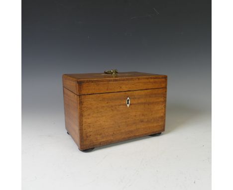 A 19thC rectangular tea caddy, of a small size, ivory lock opens hinged top to reveal two zinc lined compartments, upon four 