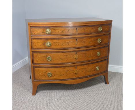 An Edwardian Sheraton Revival inlaid mahogany bow front Chest of Drawers, note damage to one side along lower edge, W 100 cm 