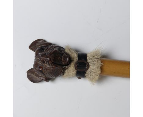 A late 19th century novelty automaton Walking Stick, the Black Forest pommel carved as the head of a dog, with articulated ja