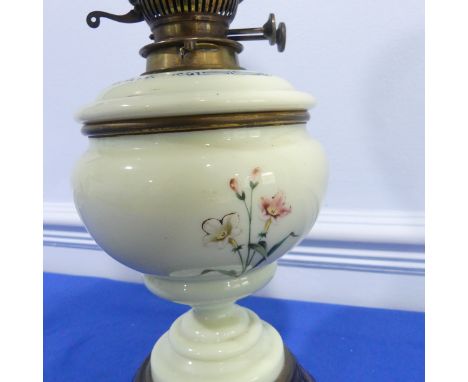 A 19th century Hinks &amp; Sons Patent, brass and milk glass oil lamp with green painted body, W 20 cm x H 56 cm x D&nbsp; 20