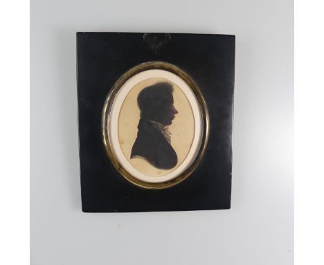 Attributed to William Alport&nbsp;(fl. 1830), Silhouette portrait of a young man profile to sinister, paint on card, oval, 8c