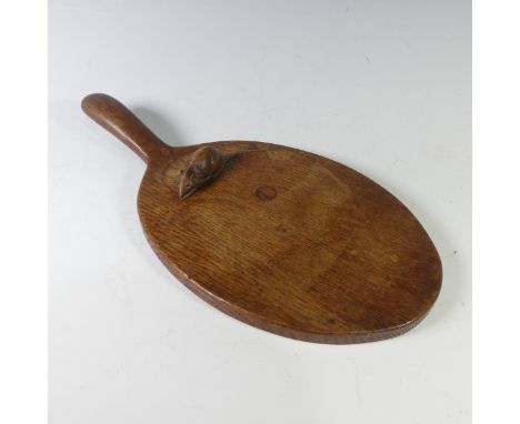 Robert 'Mouseman' Thompson (1876-1955): An English carved Oak Cheese Board, of standard form, with carved mouse trademark on 